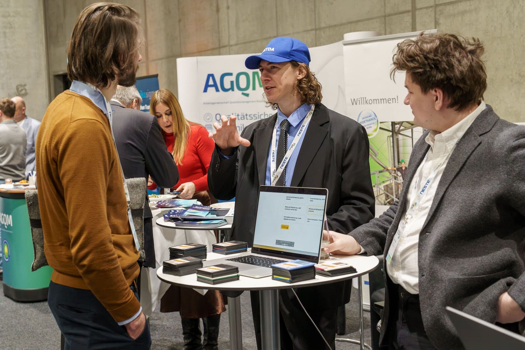 Andreas Bohdan Dreihaupt and Nikita Fordui demonstrating Crosscheck at an industry event
